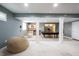 Finished basement showcasing play area, kitchenette, and pool table at 5624 Ottawa Pass, Carmel, IN 46033