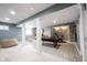 Finished basement featuring pool table, seating area, and kitchenette at 5624 Ottawa Pass, Carmel, IN 46033