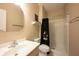 Neutral toned bathroom with a vanity, commode and shower/tub combination at 5624 Ottawa Pass, Carmel, IN 46033