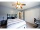 Bedroom with desk, chair, closet, and ceiling fan at 5624 Ottawa Pass, Carmel, IN 46033