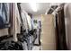 Walk-in closet featuring built-in shelving, hanging rods, and ample storage space at 5624 Ottawa Pass, Carmel, IN 46033