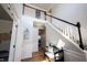 Inviting foyer featuring hardwood floors, staircase, and decorative accents at 5624 Ottawa Pass, Carmel, IN 46033