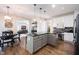 Updated kitchen with a large island, modern appliances, and open floor plan at 5624 Ottawa Pass, Carmel, IN 46033