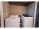 Laundry area featuring a white washer and dryer at 5624 Ottawa Pass, Carmel, IN 46033
