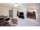 Cozy living room with open view to the kitchen and eat-in bar at 5624 Ottawa Pass, Carmel, IN 46033
