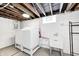 Basement laundry room with washer, dryer, and utility sink at 5933 Guilford Ave, Indianapolis, IN 46220