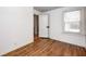 Bedroom with hardwood floors, natural light, and neutral colored walls at 5933 Guilford Ave, Indianapolis, IN 46220