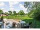 Outdoor patio with comfortable seating, perfect for relaxing and entertaining in the spacious backyard at 6223 N Parker Ave, Indianapolis, IN 46220