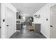 Updated kitchen with gray cabinets, stainless steel appliances, and modern countertops at 6223 N Parker Ave, Indianapolis, IN 46220