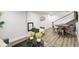 Finished basement features a seating area, stairs, game table, and modern decor creating a stylish living space at 625 N Temple Ave, Indianapolis, IN 46201