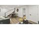 Finished basement featuring stairs, game table, and modern decor creating a versatile and stylish living space at 625 N Temple Ave, Indianapolis, IN 46201