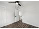 Clean and bright bedroom featuring hardwood flooring and a closet at 625 N Temple Ave, Indianapolis, IN 46201