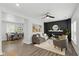 Bright living room featuring a modern fireplace, neutral decor, and an open floor plan at 625 N Temple Ave, Indianapolis, IN 46201