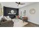 Bright living room boasts hardwood floors, a decorative fireplace, and an open layout that offers space for entertaining at 625 N Temple Ave, Indianapolis, IN 46201
