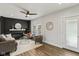 Bright living room boasts hardwood floors, a decorative fireplace, and an open layout that offers space for entertaining at 625 N Temple Ave, Indianapolis, IN 46201