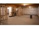 Unfinished basement with concrete flooring, natural lighting from the stairs at 6304 Frst Brk Dr, Indianapolis, IN 46259