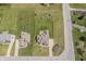 Aerial view of a property with a large, well-manicured lawn and an expansive backyard with a patio at 6472 Independence Ct, Pendleton, IN 46064