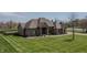 Beautiful single-story brick home with manicured lawn and long driveway in a lovely neighborhood setting at 6472 Independence Ct, Pendleton, IN 46064