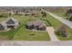 Residential single-story home with long driveway, well-maintained lawn, and mature trees in a suburban neighborhood at 6472 Independence Ct, Pendleton, IN 46064