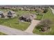 Spacious single-story home with long driveway, well manicured lawn, and mature trees in a peaceful neighborhood at 6472 Independence Ct, Pendleton, IN 46064