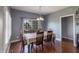 Inviting dining area with hardwood floors and sliding glass doors leading to the backyard at 6472 Independence Ct, Pendleton, IN 46064
