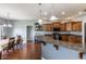 Modern kitchen features a breakfast bar, granite countertops, and stainless steel appliances at 6472 Independence Ct, Pendleton, IN 46064