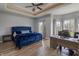 Main bedroom with a trey ceiling, large windows with natural light, and light wood flooring at 6472 Independence Ct, Pendleton, IN 46064