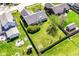 Aerial view of a home with large, fully fenced backyard, wooden deck, and mature landscaping at 7332 Quartz Rock Rd, Indianapolis, IN 46236