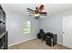 Bedroom featuring a ceiling fan, carpet flooring, a window, and neutral paint at 7332 Quartz Rock Rd, Indianapolis, IN 46236