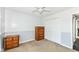 Bedroom featuring wood furniture, closet, carpet flooring, and neutral paint at 7332 Quartz Rock Rd, Indianapolis, IN 46236