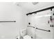 Bathroom featuring a glass-enclosed shower and black hardware at 7656 Madden Ln, Fishers, IN 46038