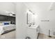 Bathroom with a double vanity, updated fixtures, and modern design at 7656 Madden Ln, Fishers, IN 46038