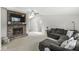 Spacious living room featuring a cozy brick fireplace, neutral decor and ample seating for relaxation at 7656 Madden Ln, Fishers, IN 46038