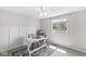 Office space with natural light, neutral paint, and work desk at 7656 Madden Ln, Fishers, IN 46038