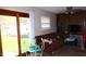Cozy living room with sliding glass doors to the outside and comfortable seating at 8017 Chiltern Dr, Indianapolis, IN 46268