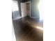 Bedroom with hardwood floors, closet, and natural light at 818 W 27Th St, Indianapolis, IN 46208
