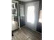 The hallway offers bright natural light and neutral wall paint at 818 W 27Th St, Indianapolis, IN 46208