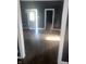 Cozy living room with hardwood floors and open doorways at 818 W 27Th St, Indianapolis, IN 46208
