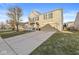 Attractive two-story home featuring a brick facade, a front porch, and an attached garage at 8327 Andrusia Ln, Indianapolis, IN 46237