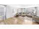 Bright living room featuring contemporary decor, wood floors and ample light at 8327 Andrusia Ln, Indianapolis, IN 46237