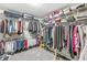 Large walk-in closet with ample storage space and custom shelving at 8327 Andrusia Ln, Indianapolis, IN 46237
