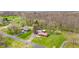 Aerial view of home on a large lot with mature trees and a large backyard at 874 S Sycamore Dr, Greenfield, IN 46140