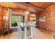 Dining room with hardwood floors, adjacent to the kitchen, and with outdoor views at 874 S Sycamore Dr, Greenfield, IN 46140