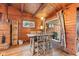 Dining room with hardwood floors, a view of the fireplace, and a sliding glass door at 874 S Sycamore Dr, Greenfield, IN 46140