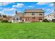 Expansive backyard featuring a gazebo, patio, and lush lawn, perfect for outdoor enjoyment and entertaining at 9319 Oak Knoll Ln, Fishers, IN 46037