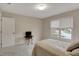 Bedroom with natural light, neutral walls and carpet, and a view of the neighborhood at 9319 Oak Knoll Ln, Fishers, IN 46037