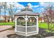 Close-up of a charming gazebo in a meticulously landscaped backyard, offering a tranquil outdoor space at 9319 Oak Knoll Ln, Fishers, IN 46037