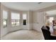 Bright home office with neutral carpet, trim, and a large window bay at 9319 Oak Knoll Ln, Fishers, IN 46037