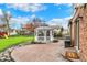 Paver patio features a gazebo, perfect for outdoor gatherings and enjoying the well-maintained backyard at 9319 Oak Knoll Ln, Fishers, IN 46037