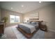 A serene main bedroom showcasing a platform bed, stylish decor, and natural light at 9455 Orchard Cove Dr, Indianapolis, IN 46239